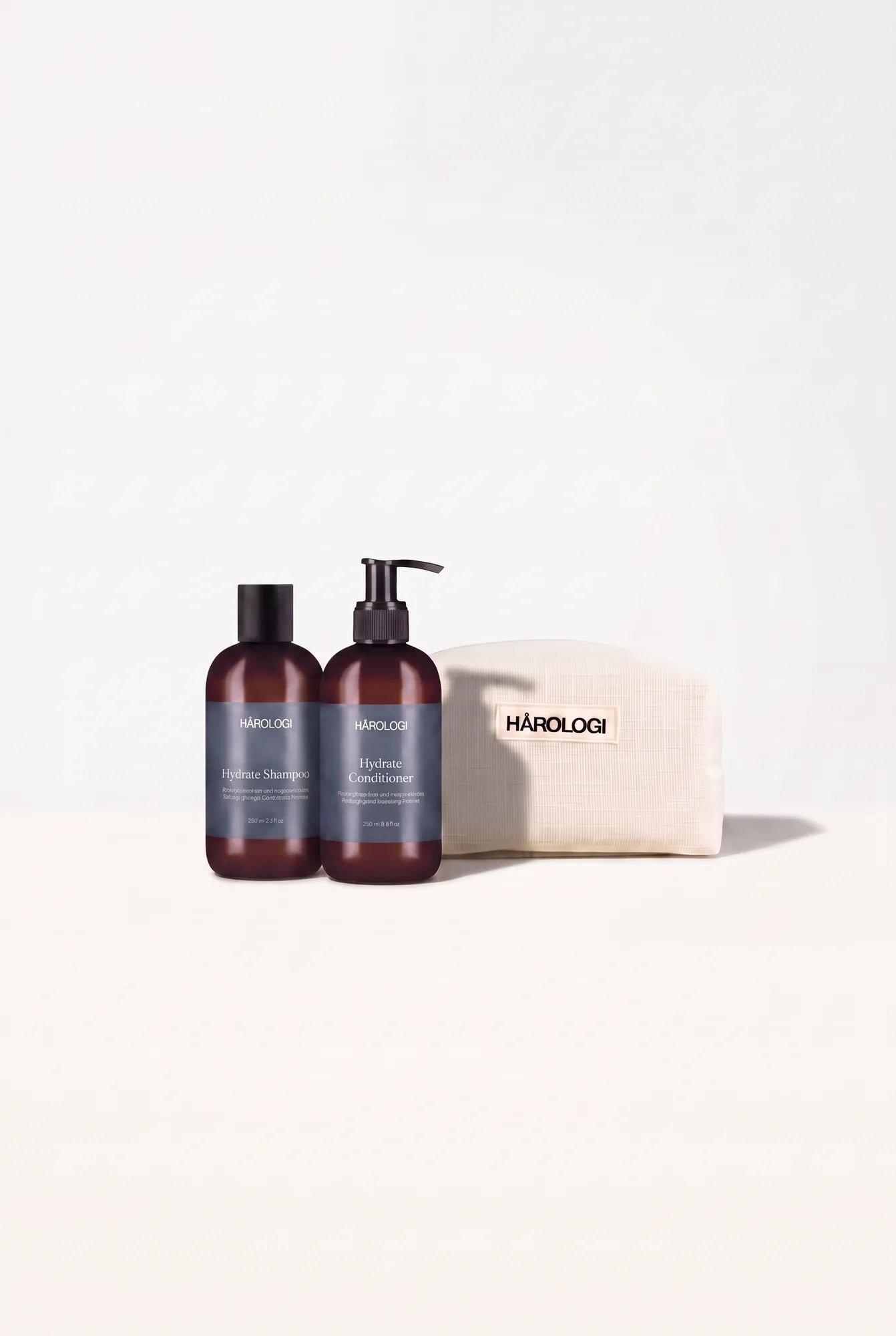 Firefly_Bra Flytta ner Hårologi Hydrate Shampoo-flaskan något så att den hamnar nästan bredv 5354
